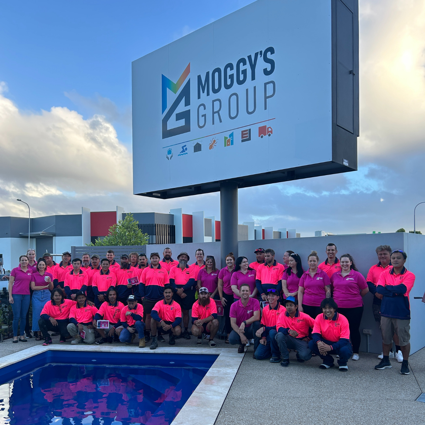 Moggy's Group team photo of the group fundraising for breast cancer