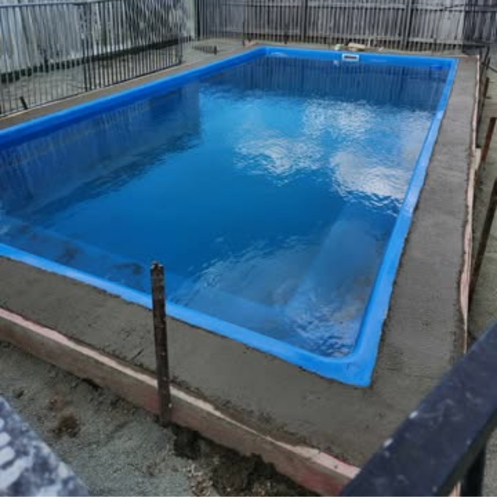 Billabong installation, concrete bond beam poured